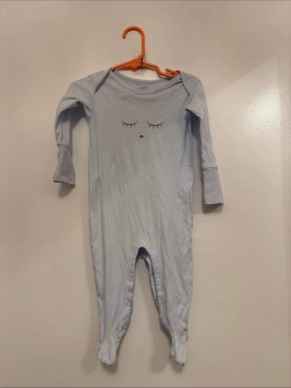 Lively Light Blue Footed Baby One-Piece with Sleepy Face
